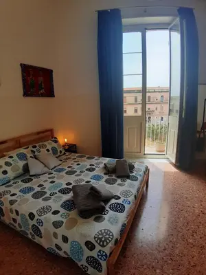 Letto o letti in una camera di DiVino Mare rooms
