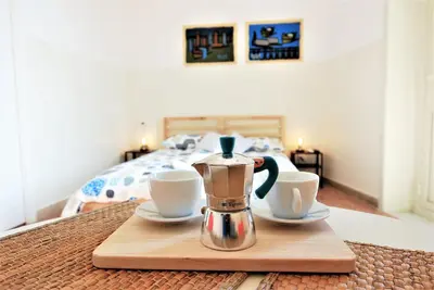 Letto o letti in una camera di DiVino Mare rooms