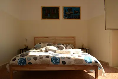 Letto o letti in una camera di DiVino Mare rooms