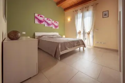 Letto o letti in una camera di Villa Tonnara Vista Mare - SiciliaVacanza