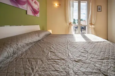 Letto o letti in una camera di Villa Tonnara Vista Mare - SiciliaVacanza