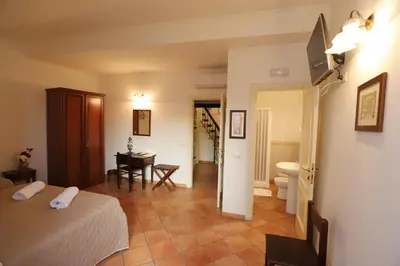 Letto o letti in una camera di Italiana Resort Magnolia
