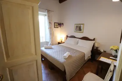 Letto o letti in una camera di Italiana Resort Magnolia