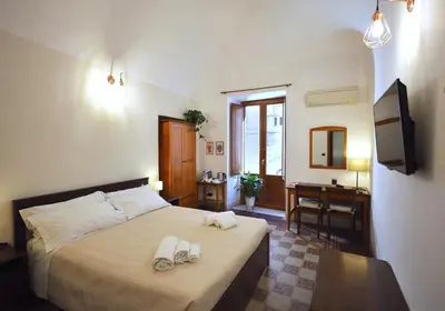 Letto o letti in una camera di Cataneasy Rooms