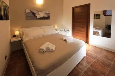 Letto o letti in una camera di Cataneasy Rooms