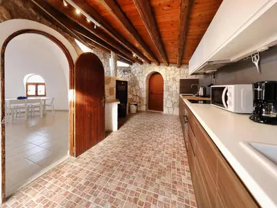 Cucina o angolo cottura di Igloo Home Plemmirio with Sea Access & Pool