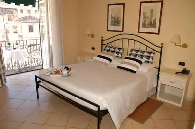 Letto o letti in una camera di Hotel Relais Modica