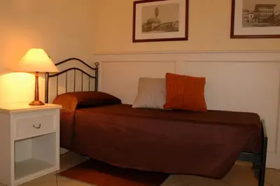 Letto o letti in una camera di Hotel Relais Modica