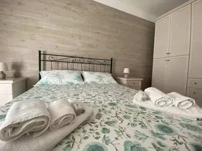Letto o letti in una camera di La Terrazza di Màriel