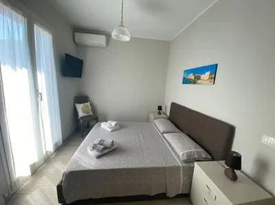 Letto o letti in una camera di La Terrazza di Màriel
