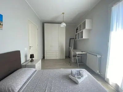 Letto o letti in una camera di La Terrazza di Màriel