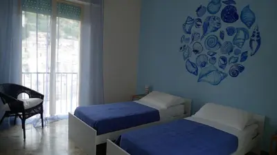 Letto o letti in una camera di I Tetti di Siciliando
