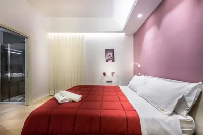 Letto o letti in una camera di Hotel Porta Reale