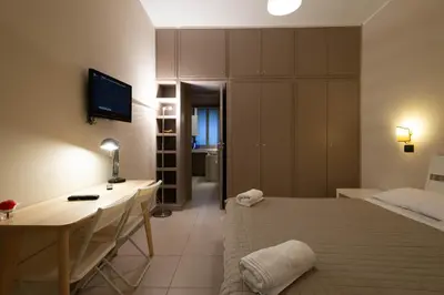 Letto o letti in una camera di Palazzo Scammacca