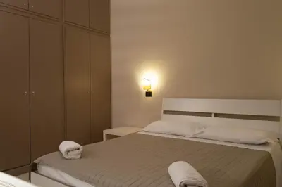 Letto o letti in una camera di Palazzo Scammacca