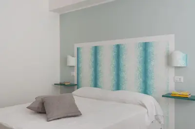 Letto o letti in una camera di Wonderful Italy Suites