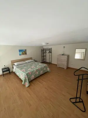 Letto o letti in una camera di Casa Crispi