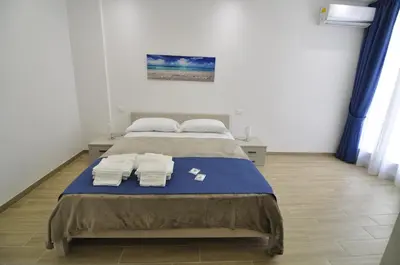 Letto o letti in una camera di IL GIARDINO NASCOSTO