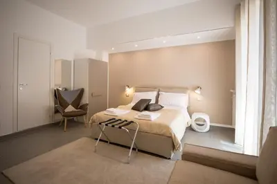Letto o letti in una camera di Prometeo rooms