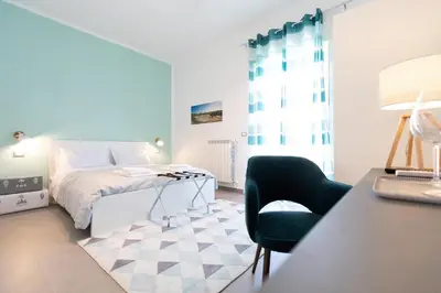 Letto o letti in una camera di Prometeo rooms