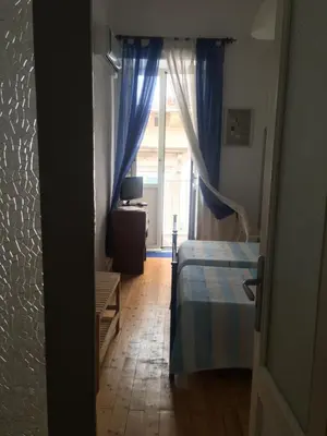 Letto o letti in una camera di B&B Domus Gaetani