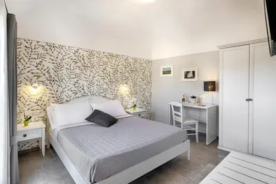 Letto o letti in una camera di Via Barocca