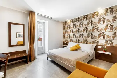 Letto o letti in una camera di Via Barocca