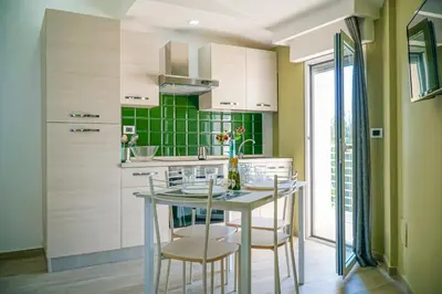 Cucina o angolo cottura di Acacia House - Few meters from the beach