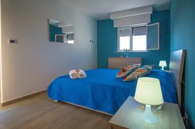 Letto o letti in una camera di Acacia House - Few meters from the beach