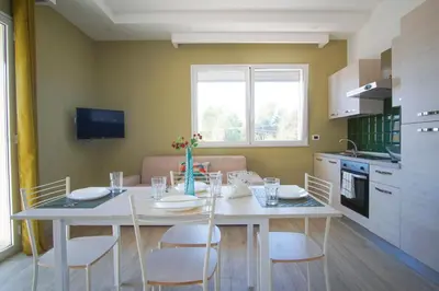 Cucina o angolo cottura di Aragosta Apartment - Sea View, a few steps from the beach