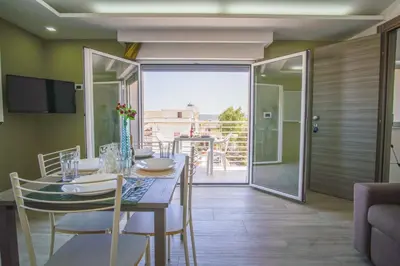 Balcone o terrazza di Laguna Blu Apartment - Panoramic View, Very close to the beach