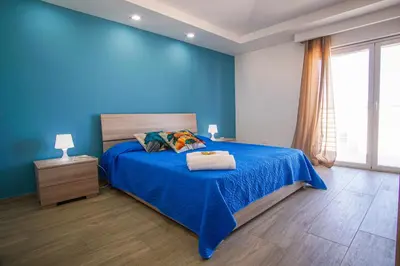Letto o letti in una camera di Laguna Blu Apartment - Panoramic View, Very close to the beach