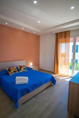 Letto o letti in una camera di Stella Marina Apartment - Sea View, close to the beach