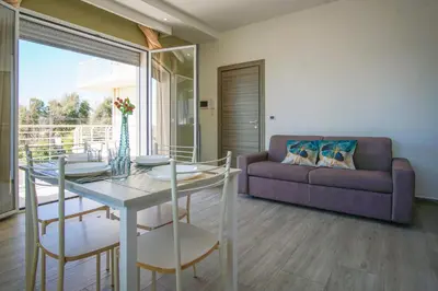 Area soggiorno di Stella Marina Apartment - Sea View, close to the beach