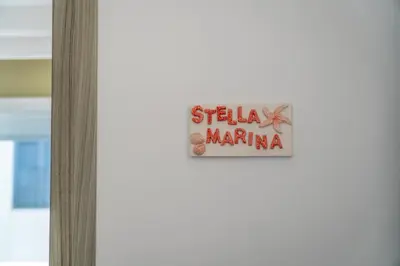 Certificato, attestato, insegna o altro documento esposto da Stella Marina Apartment - Sea View, close to the beach