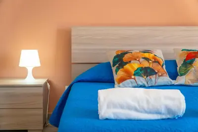 Letto o letti in una camera di Stella Marina Apartment - Sea View, close to the beach