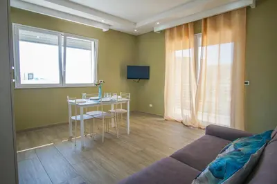 TV o dispositivi per l'intrattenimento presso Stella Marina Apartment - Sea View, close to the beach