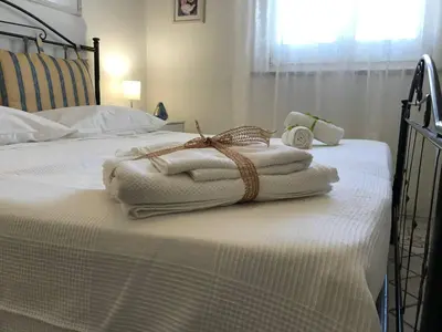 Letto o letti in una camera di Casa vacanze Borgo marinaro
