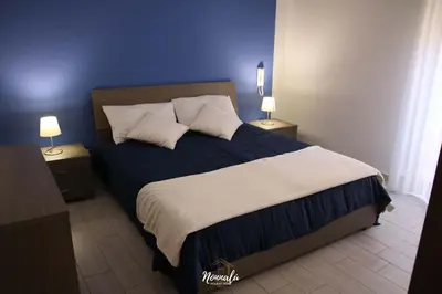 Letto o letti in una camera di Nonnalù Holiday Home