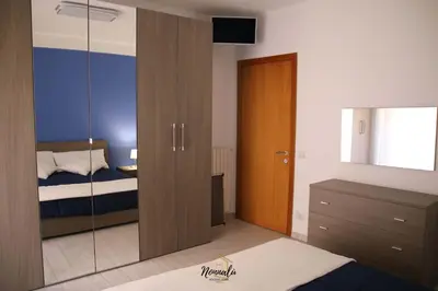 Letto o letti in una camera di Nonnalù Holiday Home