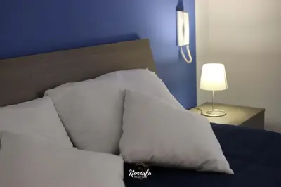Letto o letti in una camera di Nonnalù Holiday Home