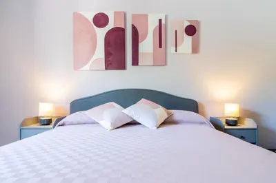 Letto o letti in una camera di Villa delle Lantane San Lorenzo Marzamemi