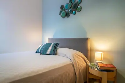 Letto o letti in una camera di Villa delle Lantane San Lorenzo Marzamemi