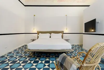Letto o letti in una camera di A.D. 1768 Boutique Hotel