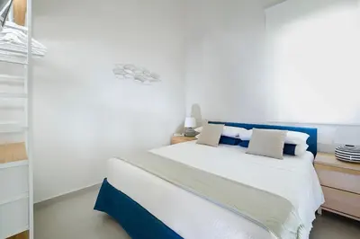 Letto o letti in una camera di Marisol