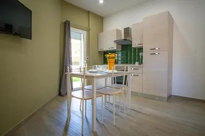 Cucina o angolo cottura di Smeralda House - A few meters from the beach