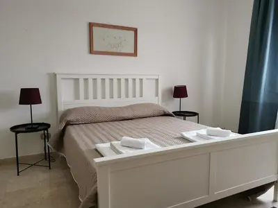 Letto o letti in una camera di Boudoir Brenta