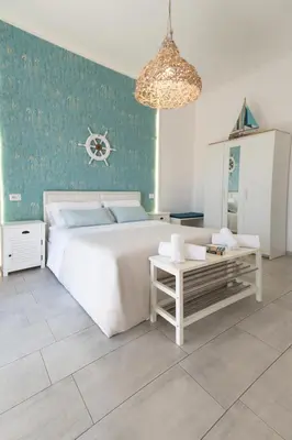 Letto o letti in una camera di Catania Over Time - Tourist Rooms