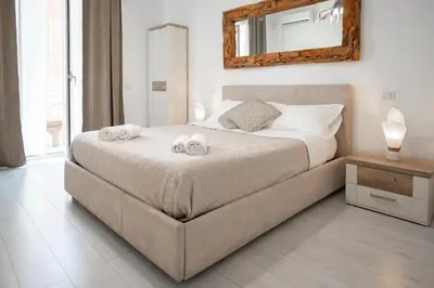 Letto o letti in una camera di Catania Over Time - Tourist Rooms