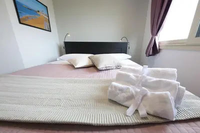 Letto o letti in una camera di Sunrise B&B Sicilia Avola